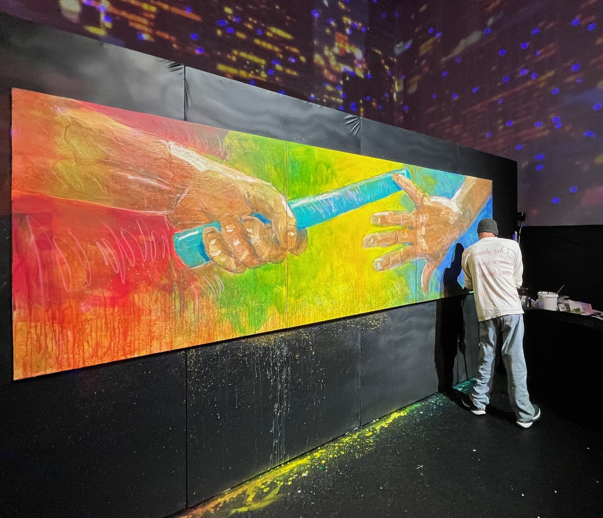 Gregory painting the LA28 mural live, Hollywood 2025